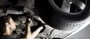 Mechanic Fixing Car